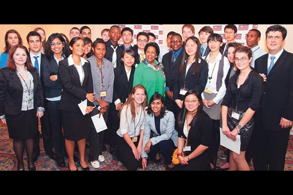 Students who won awards in an essay writing contest organized by the Gülen Institute and the Rumi Forum pose for a group photo in Washington on Wednesday.