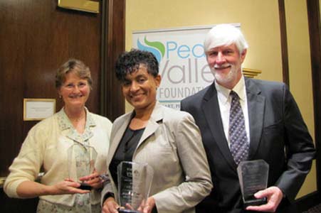 Kay Campbell, religion reporter for The Huntsville Times, at left, joins Huntsville High School teacher Chanda Davis and the Rev. Frank Broyles as honorees for Community Service in Media, Education and Community Service, respectively, by the Peace Valley Foundation, a non-profit education organization dedicated to building communication and understanding among all people. Huntsville, Ala., Thursday, April 18, 2013. (Courtesy of the Rev. Dr. Wanda Gail Campbell)