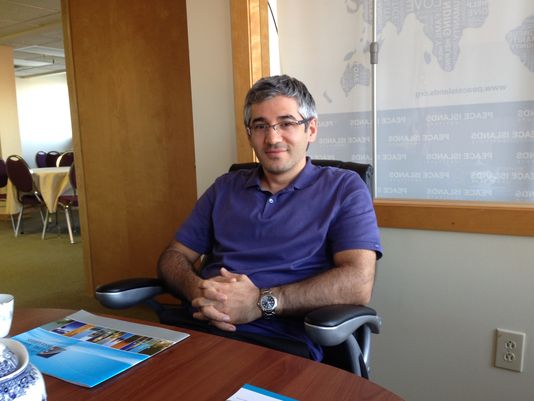 Adem G. Aydin, outreach coordinator, sits in a meeting room of Turkish Cultural Center Vermont, which opened its new office at the end of May.
(Photo: TIM JOHNSON / FREE PRESS )